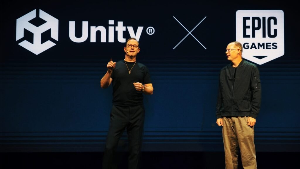 Unity & Epic Games Partnership: What Does This Historic Collaboration Mean for Game Development? Unity and Epic Games executives announcing historic partnership at Unite 2025 conference with company logos collaboration